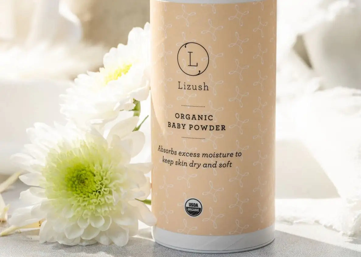 Lizush organic baby powder container with floral design absorbs moisture for soft skin